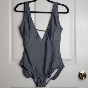 Cup She one piece swimsuit in steel gray with a dark greenish tint ruffle Medium